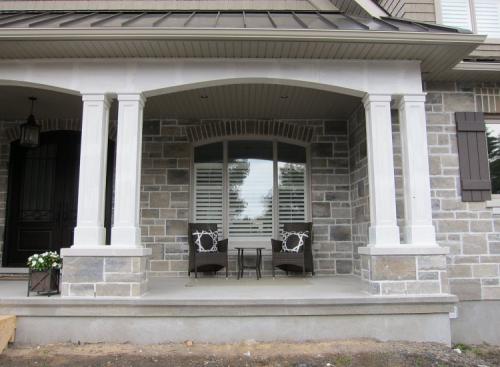 House of Fine Carpentry Paneled Permacast Columns with Header